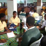 Girls of Aburi Girls Secondary School engaged in group discussions on the role and involvement of on young women in leadership 